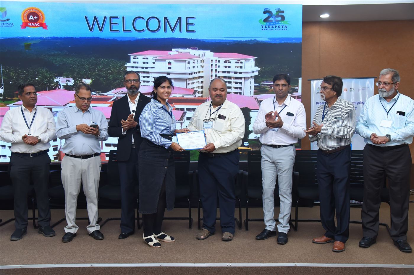 Dr. Namrata Chakraborty being felicitated at a conference